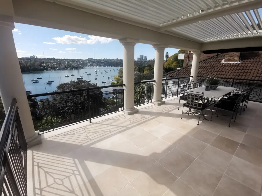 Travertine terrace tiling overlooking a Sydney harbour bay
