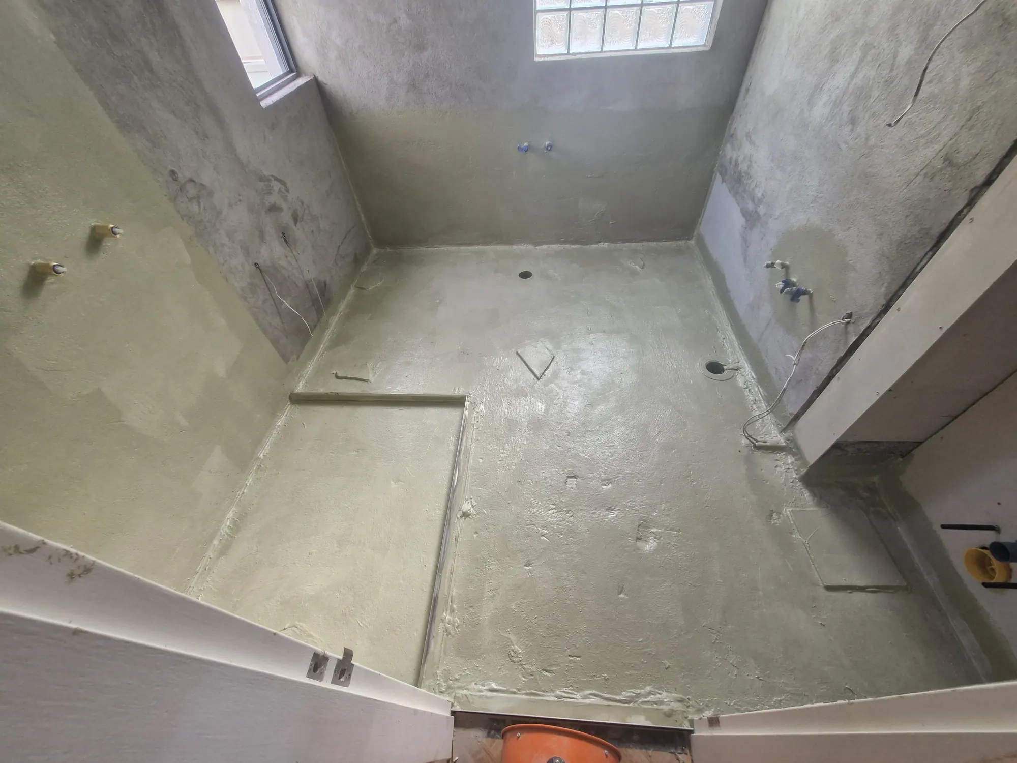 Bathroom substrate being prepared ahead of waterproofing